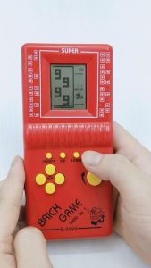 Máy chơi game cầm tay 4 nút cổ điển xưa Brick 10000 trò huyền thoại máy game điện tử xếp gạch xếp hình tuổi thơ 8x 9x (Không kèm pin)