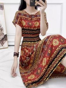 ชุดเดรสผ้าป๊อปปลิ้นลายดอกไม้สไตล์ชนเผ่าใส่ช่วงฤดูร้อนสำหรับใส่ไปริมทะเลในวันหยุดเดรสผ้าฝ้ายเทียมแบบนางฟ้าเดรสยาวคลุมเข่าพิมพ์ลายไซส์ใหญ่