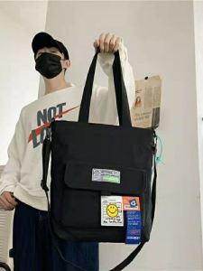 กระเป๋าผ้าใบทรงสี่เหลี่ยมจัตุรัสความจุขนาดใหญ่สำหรับผู้ชาย กระเป๋าสะพายไหล่แบบลำลอง กระเป๋าสะพายข้างแบบลำลอง กระเป๋าใส่ของใช้สำหรับเยาวชน