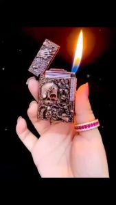 bật lửa dupont hình đầu lêu khắc nổi - xài gas