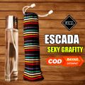 PARFUM ESCADA SEXY GRAVITY NON ALKOHOL TAHAN LAMA ISI 100ML 50ML 30ML WANGI KALEM  | Andri parfume. 