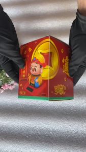Tượng thần tài tự động gật đầu dùng pin năng lượng mặt trời