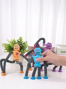 BABY.s HOME | Light-up Suction Cup Stretching Robot Educational Creative Stress-relieving Toy BABYSHOME