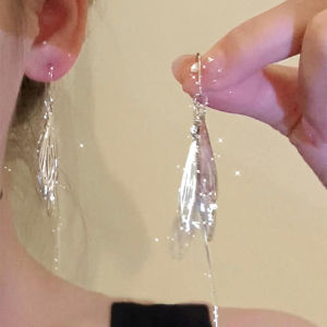 Elegant Long Silver Feather Tassel Earrings for Oval And round Faces New 2025 Luxury Sensation Fashion Jewelry Accessories