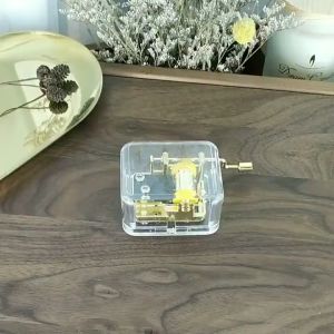 Exquisite Clear Acrylic Square Gold Hand Cranked Note Music Play Box