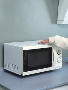 ผ้าคลุมกันฝุ่นสำหรับเตาอบไมโครเวฟเครื่องใช้ในครัวเรือนผ้ากันฝุ่นพร้อมถุงเก็บด้านข้างพื้นผิวเรียบกันน้ำทนทานต่อการสึกหรอที่คลุม