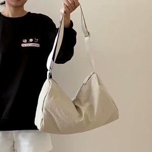 New UNIQLO Nylon bag waterproof bag Large capacity fitness bag Solid Color Messenger Bags Korea fashion