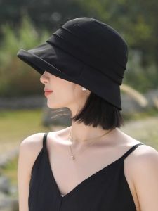 Fashionable Summer Women's Bucket Hat Sunscreen UV Protection Casual Style Cotton Material Round Top Short Brim Shopping Streetwear\\n\\n Introduction to Summer Women's Bucket Hats\\n\\nSummer women's bucket hats have gained popularity in recent years due to their stylish appearance and practical benefits. These hats, also known as round top short brim hats, are designed to provide UV protection while adding a casual touch to any outfit. In this article, we will explore the benefits of these hats, how to choose the right one, and styling tips to make the most out of your summer bucket hat.\\n\\n What Are Round Top Short Brim Hats?\\n\\nRound top short brim hats, also known as bucket hats, are a type of casual hat that features a rounded crown and a short brim. They are typically made from lightweight materials like cotton, making them perfect for warm weather. These hats have become increasingly popular among women due to their versatility and ability to complement various outfits.\\n\\n Benefits of UV Protection Sunscreen Hats\\n\\nOne of the most significant benefits of summer women's bucket hats is their ability to provide UV protection. These hats are designed to shield your face, neck, and ears from harmful UV rays, reducing the risk of sunburn and skin damage. In addition to protecting your skin, these hats can also help keep you cool by providing shade and blocking sunlight.\\n\\n Streetwear Shopping Hat Trends\\n\\nBucket hats have become a staple in streetwear fashion, making them a popular choice among women who want to stay trendy. These hats can be paired with almost any outfit, from casual streetwear to more formal attire. Whether you're shopping at the mall or enjoying a day at the beach, a round top short brim hat is a versatile accessory that can elevate your look.\\n\\n Choosing the Right Casual Cotton Material Hat\\n\\nWhen selecting a summer women's bucket hat, it's essential to consider factors like comfort, fit, and care. Here are some tips to help you choose the perfect hat for your needs.\\n\\n How to Select a Comfortable Cotton Bucket Hat\\n\\nCotton is a popular material for bucket hats due to its lightweight and breathable nature. When shopping for a cotton bucket hat, look for one that feels soft against your skin and doesn't cause irritation. Additionally, consider the thickness of the fabric; a thicker material may provide better UV protection.\\n\\n Tips for Finding the Perfect Fit\\n\\nA well-fitting bucket hat should sit comfortably on your head without feeling too tight or loose. To find the perfect fit, consider trying on different sizes and styles until you find one that feels just right. Some hats may come with adjustable straps or ties, which can help customize the fit to your liking.\\n\\n Care and Maintenance of Cotton Hats\\n\\nTo keep your cotton bucket hat looking its best, it's essential to care for it properly. Follow the manufacturer's instructions for washing and drying, and avoid exposing the hat to excessive heat or sunlight. Store your hat in a cool, dry place when not in use to prevent damage or deformation.\\n\\n Styling Your Summer Women's Bucket Hat\\n\\nOnce you've chosen the perfect summer women's bucket hat, it's time to style it! Here are some tips to help you make the most out of your new accessory.\\n\\n How to Style a Round Top Short Brim Hat\\n\\nBucket hats can be styled in various ways depending on your personal taste and the occasion. For a casual look, pair your hat with shorts, a tank top, and sneakers. For a more formal outfit, consider wearing your hat with a dress or skirt. Experiment with different hairstyles and accessories to find the perfect combination that complements your hat.\\n\\n Streetwear Shopping Hat Outfit Ideas\\n\\nBucket hats are a popular choice among streetwear enthusiasts due to their versatility. Pair your hat with a graphic t-shirt, jeans, and sneakers for a classic streetwear look. Alternatively, try pairing your hat with a crop top, high-waisted pants, and ankle boots for a trendy twist on the traditional bucket hat style.\\n\\n Complementing Your Look with UV Protection Sunscreen Hats\\n\\nIn addition to protecting your skin from harmful UV rays, a bucket hat can also complement your overall look. Choose a hat color that complements your skin tone and hair color, and consider incorporating patterns or prints into your outfit to add visual interest. Remember, the goal is to create a cohesive look that makes you feel confident and stylish.\n}