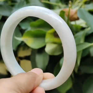 Crafted as 59.6mm Peace Bangle on Natural Type A Jadeite Jade certificate weighs 59.79 grams Width: 12.6 mm Thickness: 8.2 mm (bangle22)