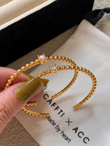 CAFFTI | Golden Zircon Open-ended Twist Bamboo Cuff Bracelet