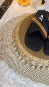 Men017 Black leather sandals with brown straps. Non-slip textured soles. Casual footwear