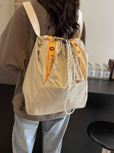 กระเป๋าเป้สะพายหลังผ้าใบผูกเชือกสำหรับเดินทางและเดินทางไปทำงานแบบผู้หญิง กระเป๋าถือขนาดใหญ่ 35x15x41cm กระเป๋าผ้าไนลอน