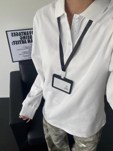 Cleanfit เสื้อโปโลแขนยาวสีขาวสำหรับผู้ชาย ทรงหลวม ผ้าโพลีเอสเตอร์ กันแบคทีเรีย เสื้อเชิ้ตทรงพื้นฐานสไตล์อเมริกัน