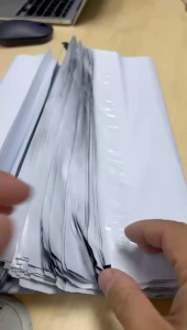 Clear Stocks promosi 100pcs grey/white Courier Bag/flyers defect stocks