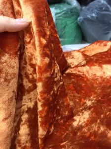 vải nhung tuyết hoa màu cam tươi _( khổ 1m6) co dãn 4 chiều mềm rũ may đầm váy áo dài vv