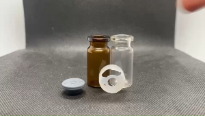 ขวด 7 มล.(50ใบ) แก้ว ไหล่โค้ง +จุกเทา +ฝาครอบ