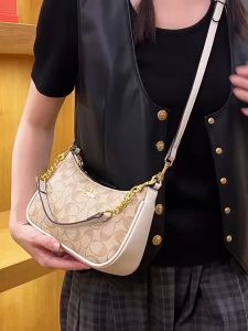 One shoulder hand crossbody armpit fashion integrated commuter cowhide crescent woman bag niche design dumpling bag