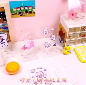 Tempat Tatakan Stand Handphone Bening dengan Bentuk Unik & Lucu