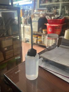 Bình vòi sắt có sẵn dầu máy may