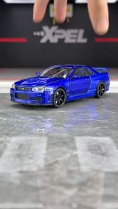 【จัดส่งจากกรุงเทพ】วัสดุโลหะผสม NISSAN SKYLINE GTR R34รถรุ่น รถของเล่นเด็ก