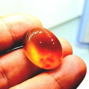 Batu cincin katilayu merah super / akik amber katilayu giwang redish batu mengambang di air garam