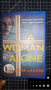 A WOMAN ALONE by NINA LAURIN