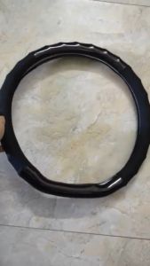 Bọc vô lăng Da Carbon chữ D cut Xe Kia SELTOS