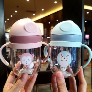 Childrens Sports Water Bottle Anti-Choking Handle Anti-Leak Cartoon Baby Milk Drinking Cup Gravity Ball Macaron Color