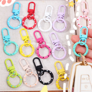 พวงกุญแจหัวเข็มขัดสปริงลายจุดสีลูกกวาดสุดสร้างสรรค์5ชิ้นพวงกุญแจโดนัทน่ารักอุปกรณ์จี้ทำมือ DIY