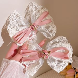 C.three Ballet Style Headdress Lace Ribbon Bow Hair Clip Women Forest Style High-end Hair Clip\\n\\n Introduction to Women's High-end Forest Style Hair Clip\\n\\nC.three Ballet Style Headdress Lace Ribbon Bow Hair Clip is a high-end women's hair accessory that brings elegance and sophistication to any outfit. This unique hair clip combines the vintage charm of ballet-inspired designs with the natural beauty of forest style elements. The clip's retro design and intricate details make it a must-have for fashion-conscious women who appreciate timeless, classic styles.\\n\\n Key Features of the Hair Clip\\n\\nThe C.three Ballet Style Headdress Lace Ribbon Bow Hair Clip offers several key features that set it apart from other hair accessories:\\n\\n- **Three-dimensional bow design**: The clip's bow shape adds a touch of whimsy and charm to any hairstyle, while its three-dimensional construction ensures a secure fit.\\n\\n- **Ribbon and lace combination**: The clip's combination of ribbon and lace materials creates a French-style aesthetic, enhancing the overall elegance of the accessory.\\n\\n- **Embellishment for bow series clothing**: This hair clip can serve as a perfect complement to bow-themed outfits, creating a cohesive and stylish look.\\n\\n How to Use the Hair Clip\\n\\nUsing the C.three Ballet Style Headdress Lace Ribbon Bow Hair Clip is easy and straightforward:\\n\\n1. Choose your preferred hairstyle: Whether you prefer a sleek ponytail, a chic updo, or a loose, flowing style, this hair clip can be used to add a touch of elegance to any look.\\n\\n2. Position the clip: Place the clip at the desired location on your hair, ensuring that the bow faces forward and the clip is securely fastened.\\n\\n3. Adjust as needed: Depending on your hair type and length, you may need to adjust the clip's position or angle to achieve the desired effect.\\n\\n Gift-Giving Ideas for the Hair Clip\\n\\nThe C.three Ballet Style Headdress Lace Ribbon Bow Hair Clip makes an excellent gift for special occasions and thoughtful gestures:\\n\\n Special Occasions for Giving the Hair Clip\\n\\n- Birthdays: Surprise your sister, girlfriend, or female friends with this elegant hair accessory as a birthday gift.\\n\\n- Anniversaries: Celebrate a special milestone in your relationship by gifting your partner this beautiful hair clip.\\n\\n- Valentine's Day: Show your love and appreciation with this charming accessory that adds a touch of romance to any outfit.\\n\\n How to Choose the Right Recipient\\n\\nWhen selecting a recipient for the C.three Ballet Style Headdress Lace Ribbon Bow Hair Clip, consider the following factors:\\n\\n- Personal style: Ensure the recipient appreciates vintage, ballet-inspired designs and would enjoy incorporating this accessory into their wardrobe.\\n\\n- Occasion: Choose a gift-giving occasion that aligns with the recipient's interests and preferences.\\n\\n- Relationship: Consider the closeness of your relationship with the recipient and select a gift that reflects your bond.\\n\\n Product Specifications & Packaging\\n\\n Material & Size of the Hair Clip\\n\\nThe C.three Ballet Style Headdress Lace Ribbon Bow Hair Clip is made of mixed materials, ensuring durability and comfort. The product measures 8 x 5 x 3cm, making it suitable for various hair types and lengths.\\n\\n What Comes in the Package\\n\\nEach package includes one C.three Ballet Style Headdress Lace Ribbon Bow Hair Clip, ready to be unwrapped and enjoyed by the recipient. The packaging is designed to protect the accessory during shipping and storage, ensuring it arrives in perfect condition.\n}