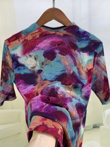 เสื้อยืดผู้หญิงคอปกสั้นพิมพ์ลายเน็ททรงสลิมฟิต แขนยาวปานกลาง ทรงเข้ารูป เสื้อผ้าทำงานฤดูใบไม้ผลิ 2025 สำหรับผู้หญิงวัย 40-49 ปี