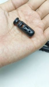 Stopper Tali YKK Model Botol Tabung Dua Lubang Untuk Tali 3 s/d 5 mm Hitam Poly Acetal Bagus Kuat Harga Per 2 Biji