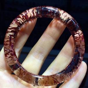 Natural red gum flower multi-layer crystal + ultra-seventh crystal pearl mica sheet bracelet. The crystals are perfectly integrated. The physical object is extremely beautiful🙏. It is dazzling and can bring good luck wealth prosperity and success.