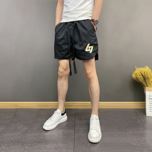 กางเกงขาสั้นชายผ้าฝ้ายบางสไตล์เกาหลีฤดูร้อน กางเกงขาสั้นชายวัยรุ่นทรงหลวมสบาย ๆ ทรงเข้ารูป กางเกงขาสั้นผ้าฝ้ายลายดอกไม้