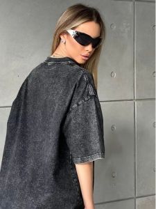 เสื้อยืดคอกลมแขนสั้นทรงหลวมสีพื้นสำหรับผู้หญิง เสื้อผ้าทำงานสไตล์ยุโรปและอเมริกัน ฤดูร้อน 2024 วัสดุอื่นๆ 100%