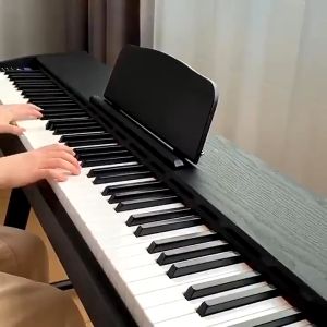 88-key portable electronic piano with three-step hammer keyboard multifunctional family for beginner