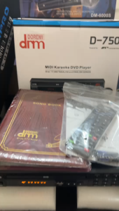 Megapro Doremi D-750 Karaoke Player (Black) Up to 20000 Songs with MTVs and MP3s with wired microphone