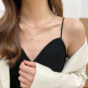 สร้อยคอไข่มุกทรงหยดน้ำแบบสองชั้นสำหรับผู้หญิง ดีไซน์เรียบหรู สไตล์เกาหลี สร้อยคอโซ่กระดูกไหปลาร้า เครื่องประดับแฟชั่น