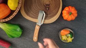Multifunctional 2-in-1 Stainless Steel Peeler with wooden handle for Peeling and Slicing Fruits and Vegetables Kitchen Tools