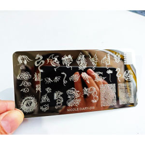 การ์ตูนมังกรงูรูปแบบแผ่นปั๊มสําหรับเล็บสแตนเลสสี่เหลี่ยมผืนผ้าเล็บแม่แบบคริสต์มาสศิลปินสัตว์