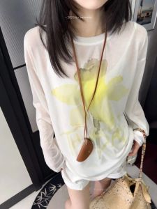 เสื้อยืดแขนยาวพิมพ์ลายดอกไม้สไตล์อเมริกัน ทรงหลวม ฤดูร้อน ใหม่ ลำลอง ปกป้องแสงแดด เสื้อผ้าทำงาน ผ้าฝ้ายผสม