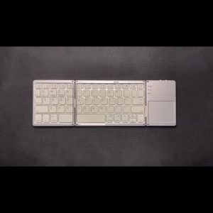 2025 Spanish Folding Keyboard For iPad Xiaomi Samsung For iOS Android Windows Tablets Phone PC Mini Bluetooth Wireless Keyboard