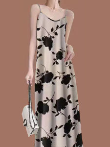 ชุดเดรสยาวแขนกุดคอวีพิมพ์ลายดอกไม้หลวมๆ สำหรับผู้หญิง ชุดทำงานฤดูร้อน 2025 ชุดทำงานลำลอง