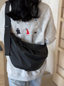 กระเป๋าสะพายไหล่ ดีไซน์พิเศษ ทำจากผ้าใบและวัสดุหนัง ความจุมาก เหมาะสำหรับกีฬากลางแจ้ง 1 อันใหญ่ และ 1 อันเล็ก