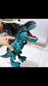Đồ chơi khủng long T-Rex đẻ trứng phun khói chiếu hình hiệu ứng âm thanh dùng pin Thế giới đồ chơi 1104
