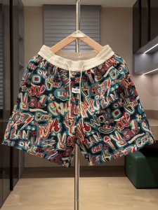 กางเกงขาสั้นผู้ชายทรงหลวมสบายๆ ทรงหลวม ทรงหลวม กางเกงขาสั้นชายหาด กางเกงขายาว 5 จุด ทรงหลวม กางเกงขายาว 5 จุด