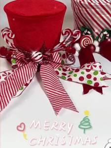 A Christmas tree top hat festive Christmas tree red top hat with cane candy decoration - perfect for Christmas tree top decorat