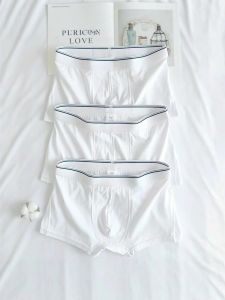 กางเกงบ็อกเซอร์ชายผ้าฝ้ายแท้สีขาวระบายอากาศได้ดี กางเกงขาสั้นทรงสปอร์ตหลวมสบาย กางเกงบ็อกเซอร์เอวกลางทรงสปอร์ตสำหรับเยาวชน