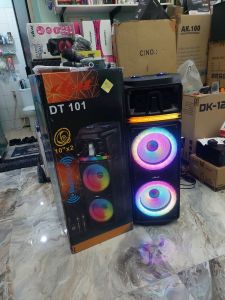 speaker aktif Trolley DAt DT 101 extra Bass profesional karaoke Multi media speaker Fasilitas 2 wirelessmicrophone feature 10inc speaker x2 rechargeable with usb and FM TF card 2mic input remote DJ Light