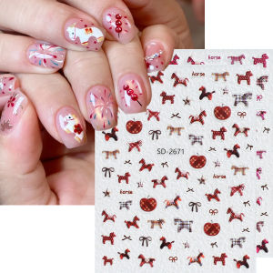 Cute red horse-patterned nail stickers for the Year of the Horse. Festive New Year nail decorations with pony bows and stars.
